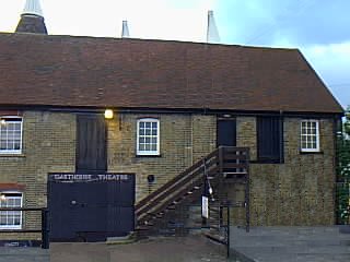 [Outside view of Oasthouse Theatre]